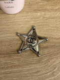 Spilla Star