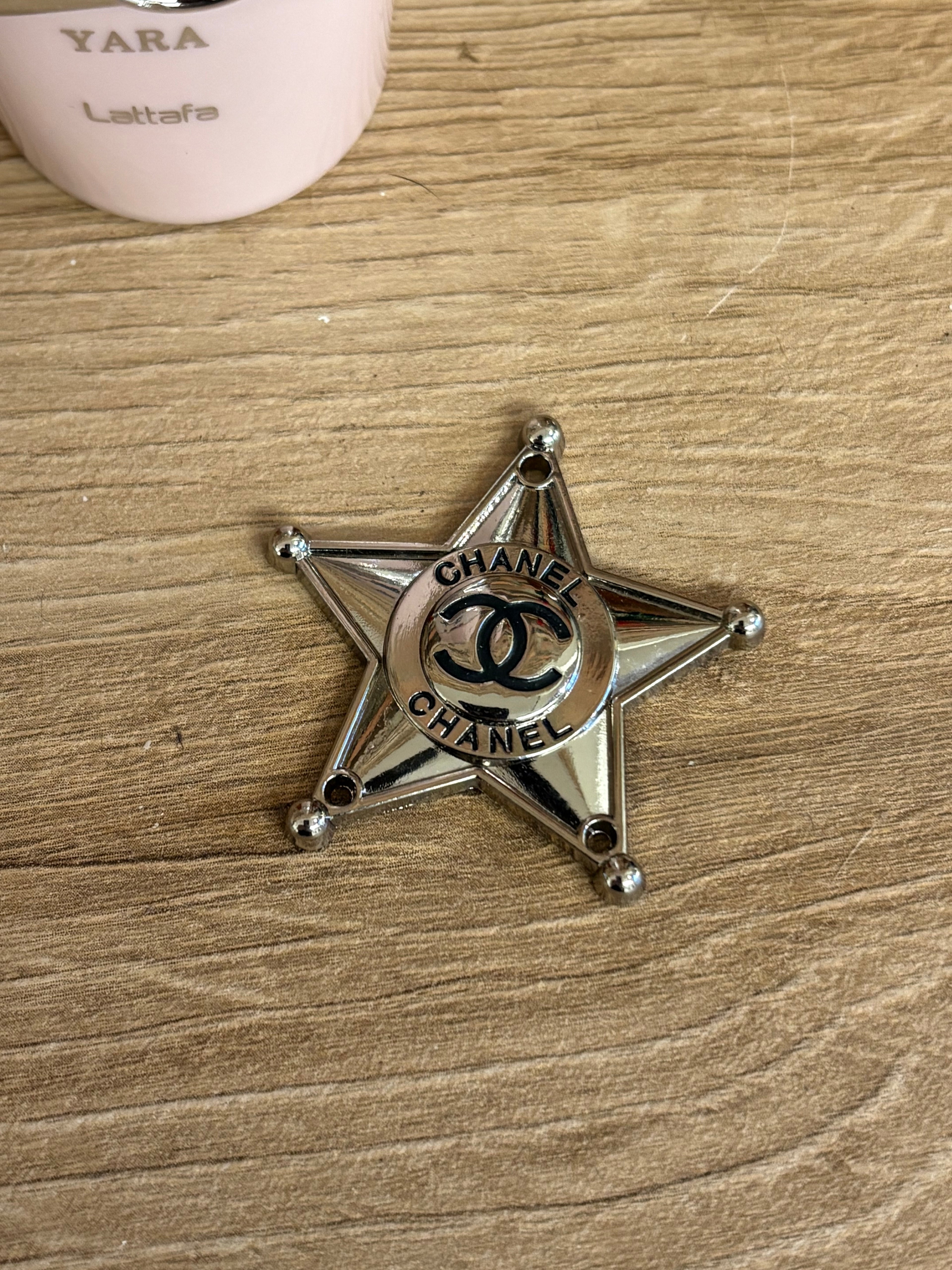 Spilla Star